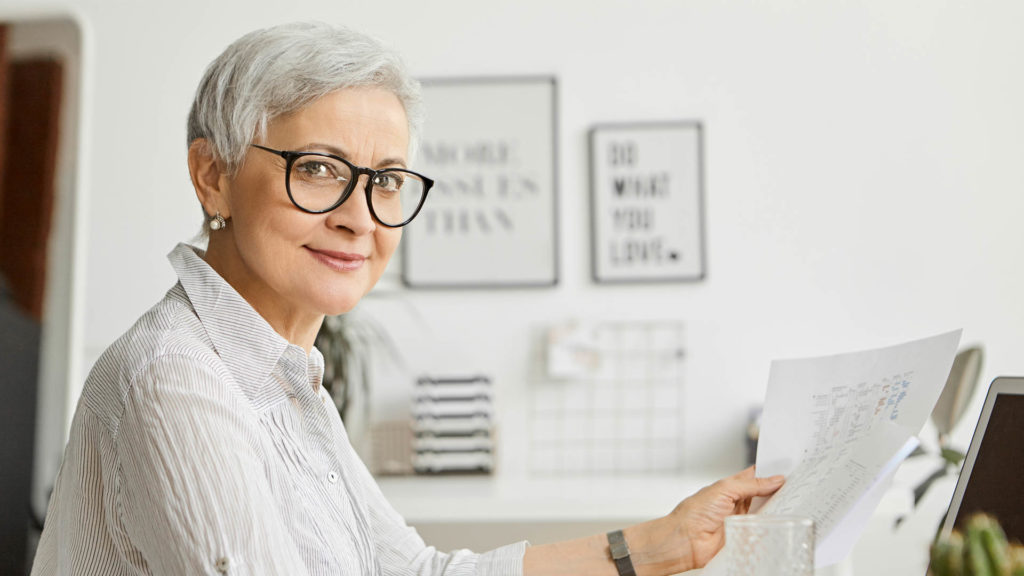 woman reading the paper 